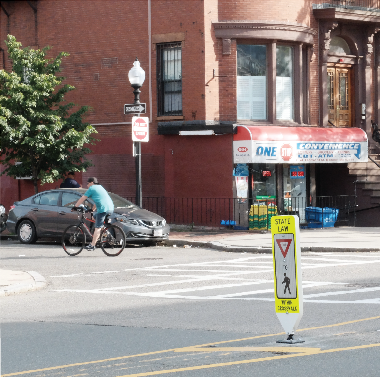 An in-street yield to pedestrian