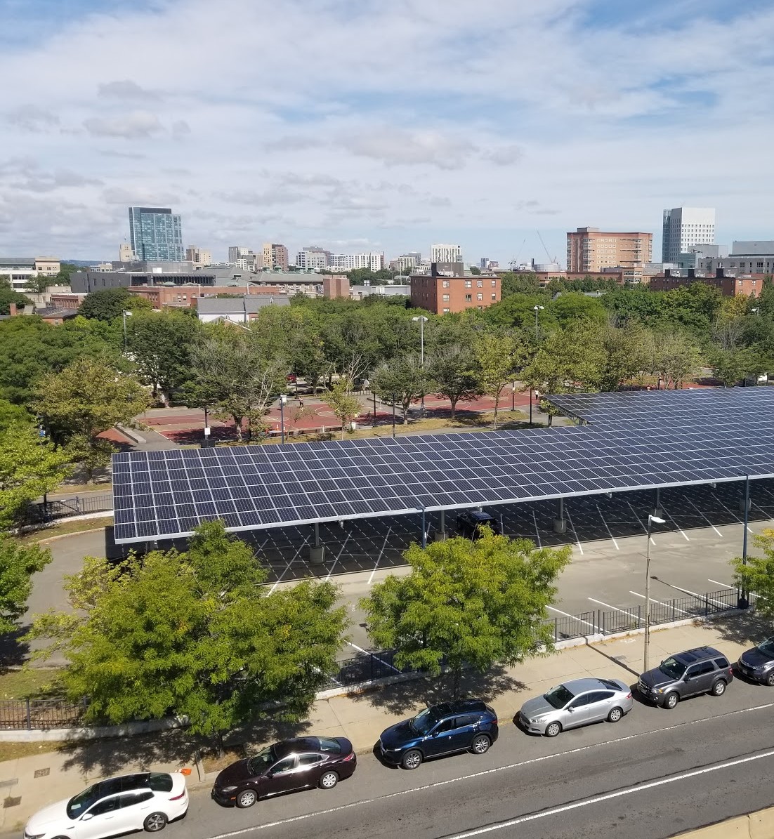 Solar panels cover a police carport in boston