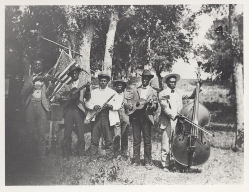 Stephenson, Mrs. Charles (Grace Murray). [Emancipation Day Celebration band, June 19, 1900], photograph, June 19, 1900; (https://texashistory.unt.edu/ark:/67531/metapth124054/m1/1/?q=emancipation: accessed June 18, 2020), University of North Texas Libraries, The Portal to Texas History, https://texashistory.unt.edu; crediting Austin History Center, Austin Public Library. 