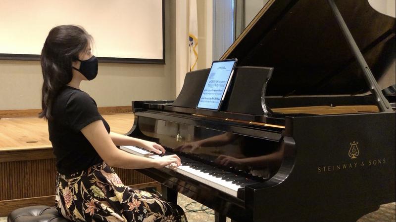 Photo of Opportunity Fund grantee Leona Cheung playing piano