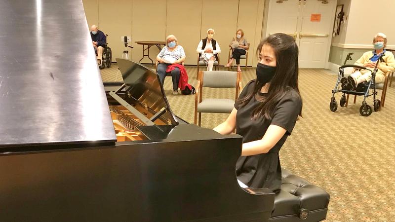 Photo of Opportunity Fund grantee Leona Cheung playing piano