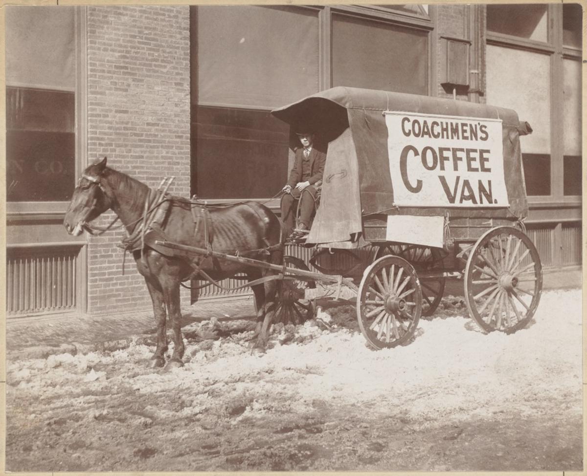 Unidentified street view (man on horse-drawn wagon advertising Coachmen Coffee Van.)