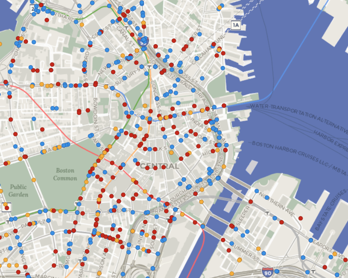 A map of streets in Boston. Yellow, blue, and red dots on the streets indicate a crash reported by EMS or BPD.