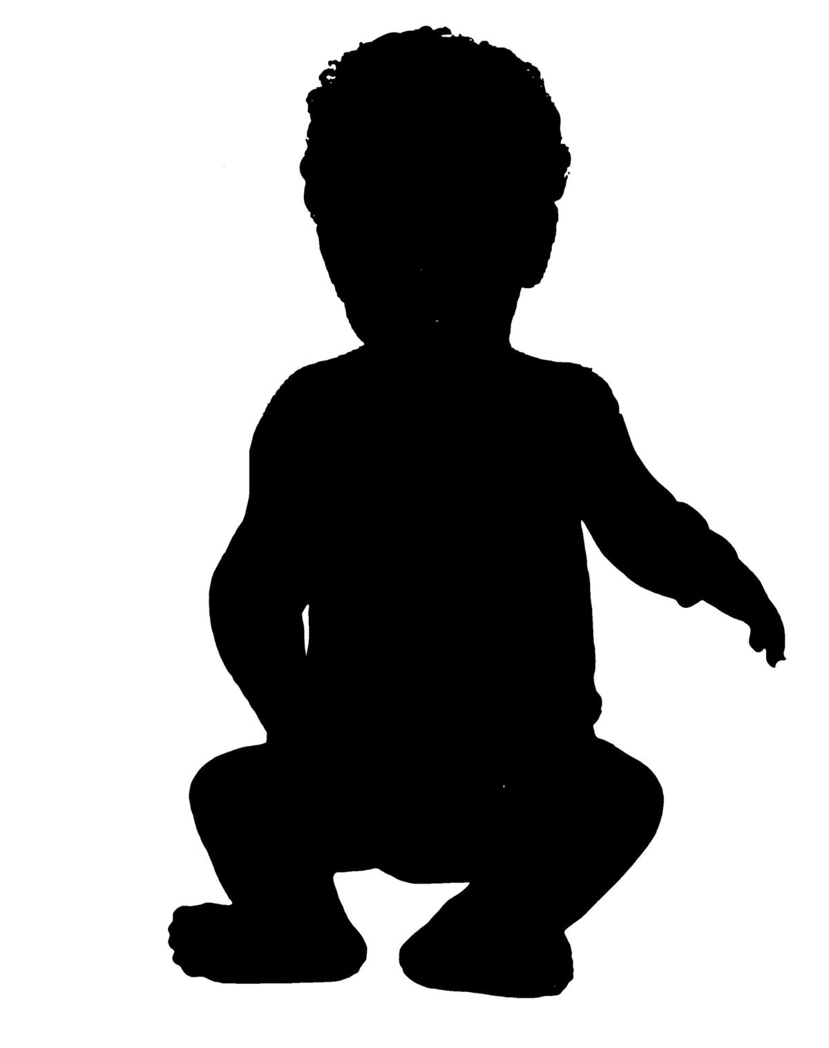 A silhouette of a seated baby