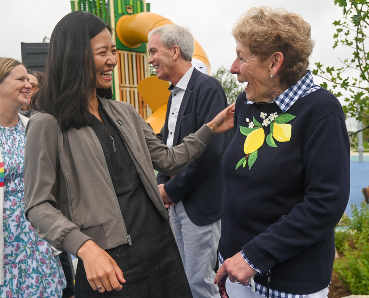 Mayor Wu greets Boston’s former First Lady Angela Menino at the June 10 opening of the Alice Hennessy Playground at Millennium Park.