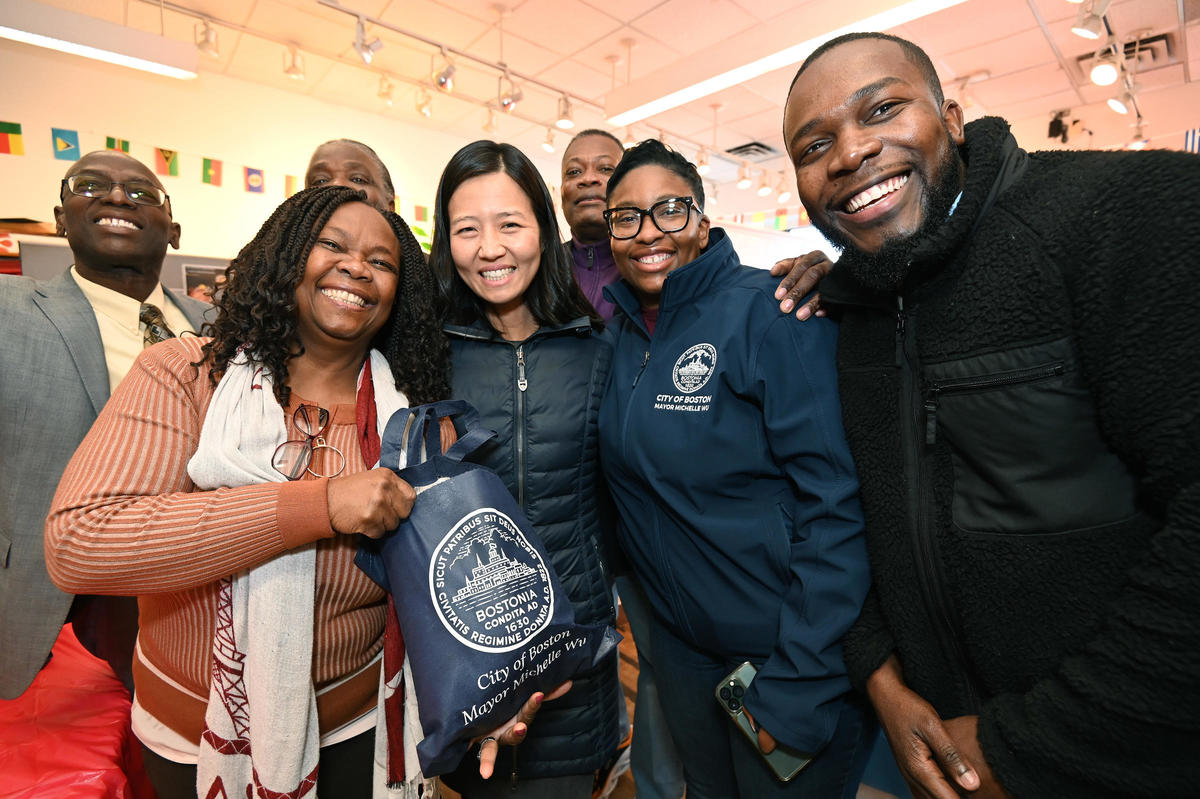 Mayor Michelle Wu, Chief Brianna Millor, and Haitian Cultural Liaison of the Mayor's Office of Neighborhood Services drop off 200 frozen turkeys donated by the City and Commonwealth Kitchen to be distributed at IFSI in Mattapan.
