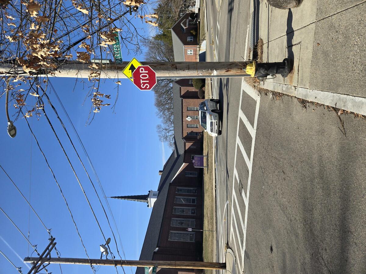 A stop sign at the intersection of Wood Avenue and Safford Street