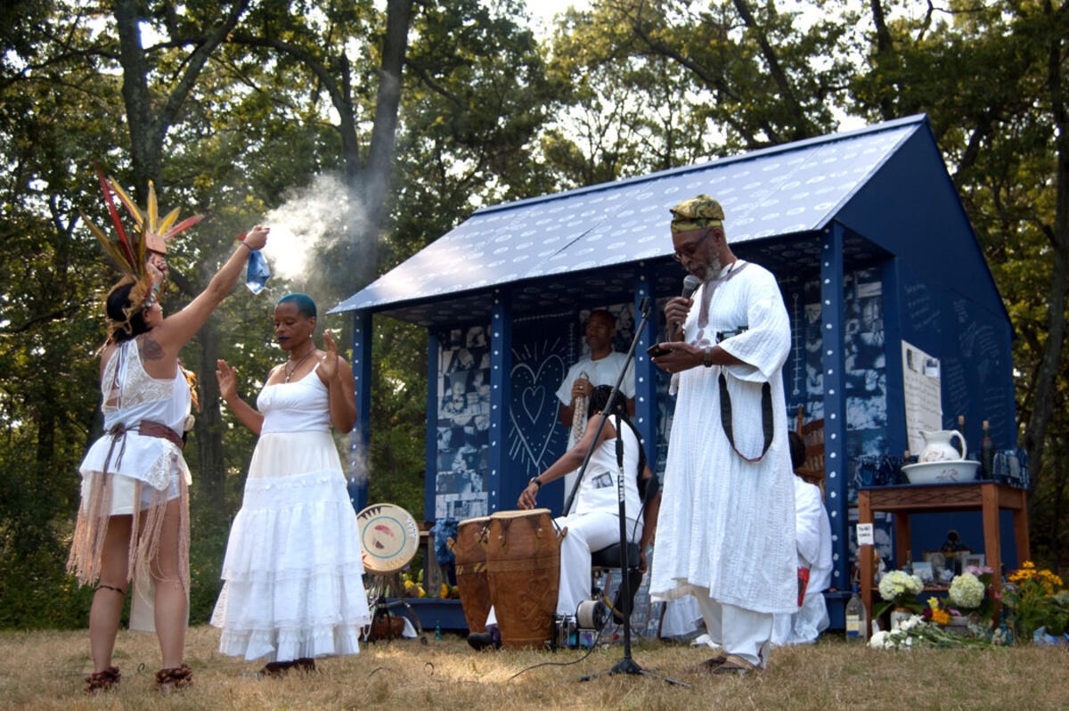 Ifé Franklin and the completed “Slave Cabin” 