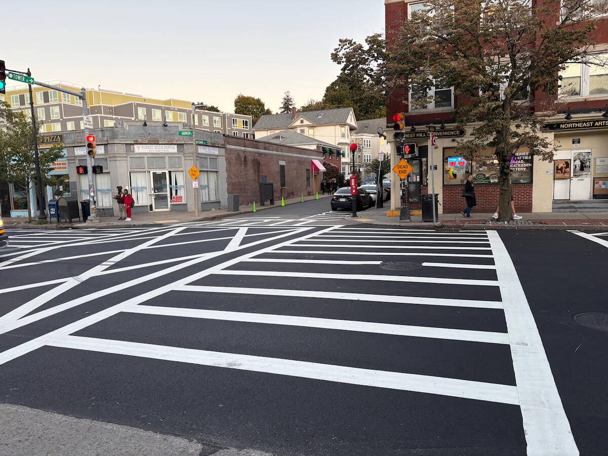 A newly installed, wider crosswalk on Hyde Park Avenue