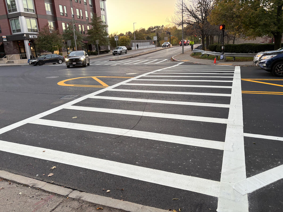 A newly installed, wider crosswalk on Hyde Park Avenue