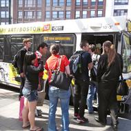 Image for people getting on mbta bus 57