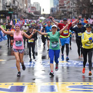 Image of runners crossing finish line in 2019 Boston Marathon