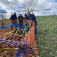 Parks Department Commissioner Woods and Archaeology Program Team look into Ronan Park well