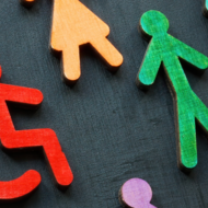 Image of stick figures in multiple colors including wheelchair users