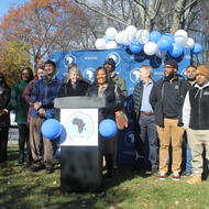 A group of Bostonians gather to celebrate the development of the Erie/Glenway project.