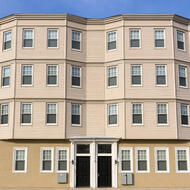A photo of 116–118 Whitfield Street, which adds eight family-sized units to Boston’s affordable housing portfolio.