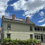 A green home with solar panels in East Boston