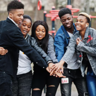 Young people in a huddle