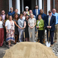 A group of people pose at the groundbreaking of McDevitt Senior Homes